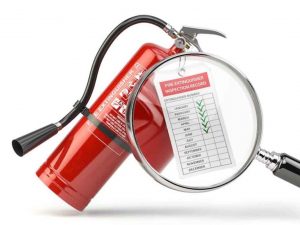 inspecting a fire extinguisher inspection tag