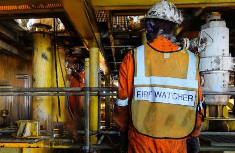 a firewatcher on duty in a hot work area