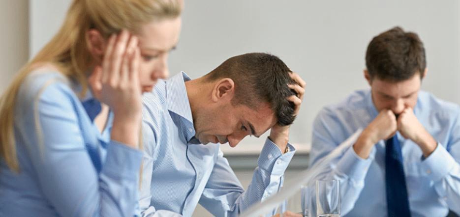 3 stressed workers in conflict at work